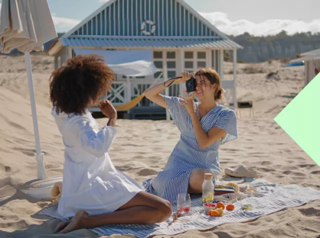 2 women enjoying life at the beach